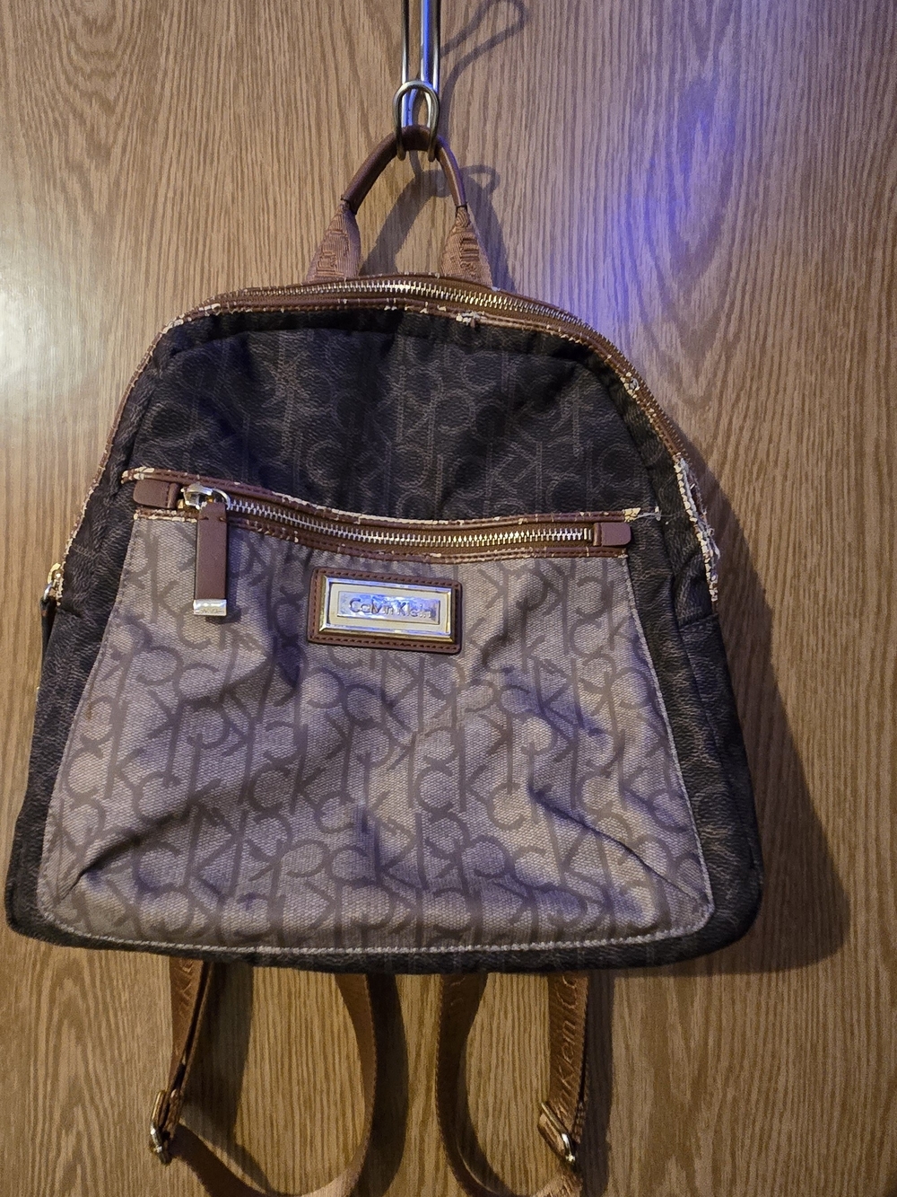 Calvin Klein Brown Monogram Backpack with Gold Accents